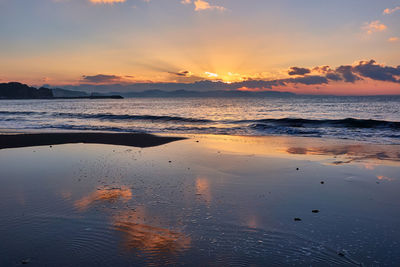 Scenic view of sea against sky during sunset