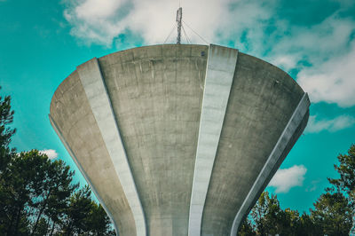 Low angle view of water tower against sky