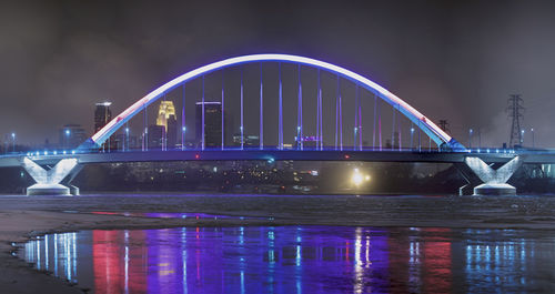 View of illuminated city at night