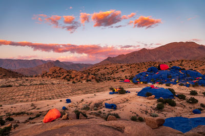 Scenic view of colored mountain in the sahara desert against sky during sunset