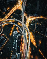 High angle view of light trails on road at night