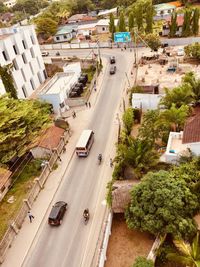 High angle view of people walking on road