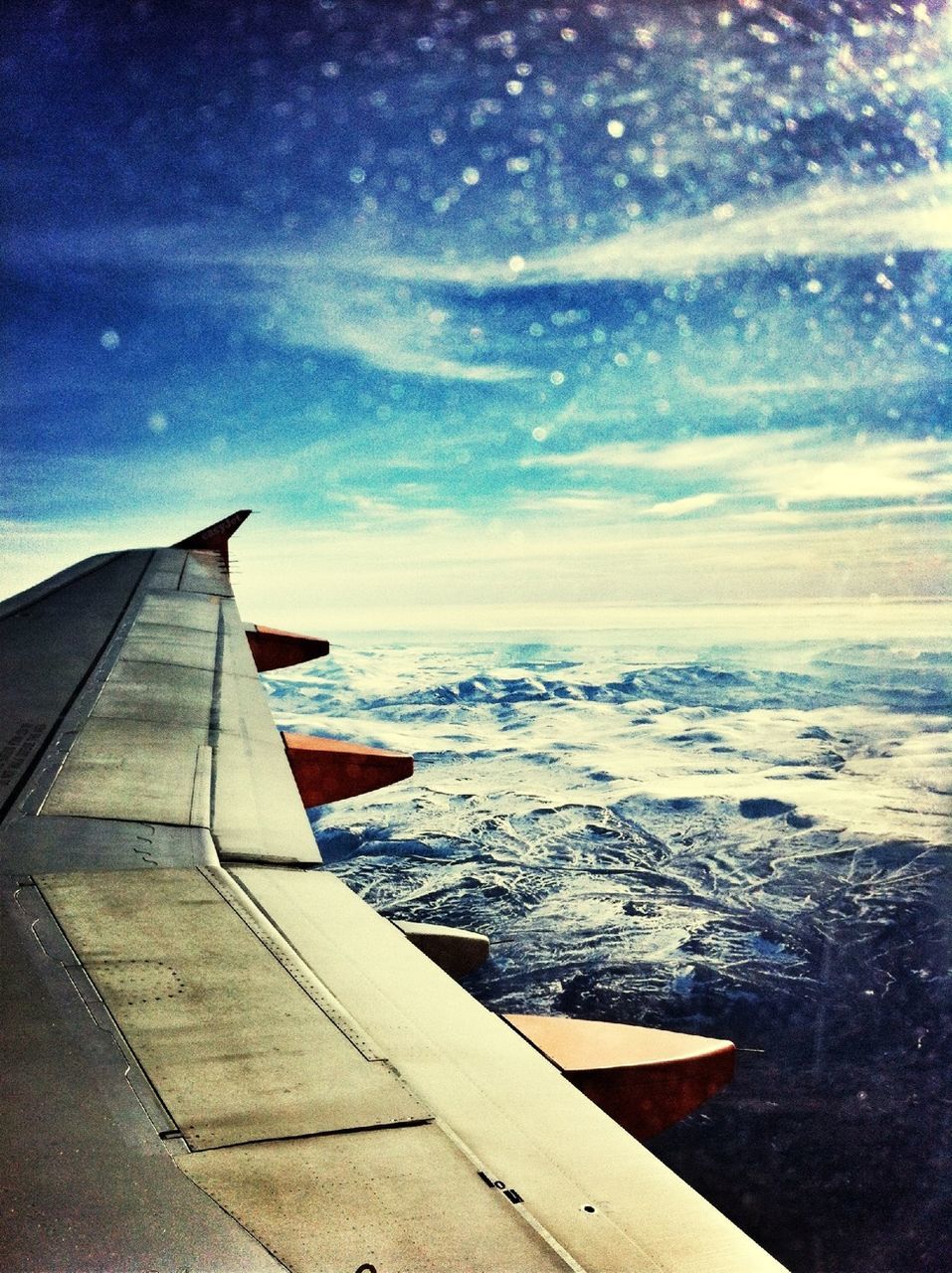 sea, water, sky, transportation, aircraft wing, horizon over water, mode of transport, airplane, flying, part of, cropped, cloud - sky, scenics, nautical vessel, nature, air vehicle, beauty in nature, aerial view, outdoors, travel