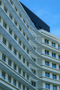 Low angle view of building against blue sky