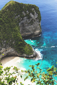 Scenic view of rocks by sea