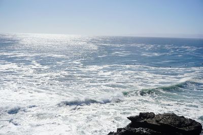 Scenic view of sea against clear sky