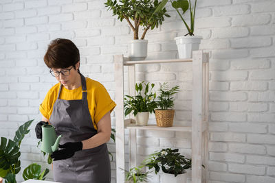 Side view of man working at home