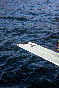 High angle view of boat floating on sea