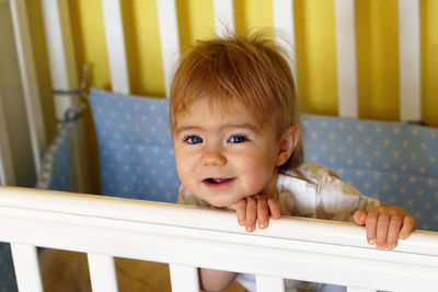 Portrait of cute baby girl at home