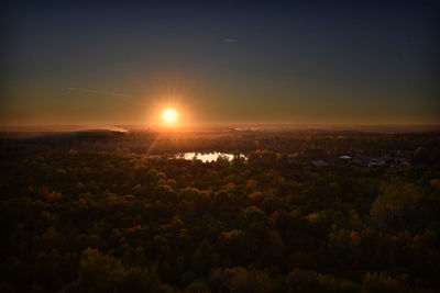 Scenic view of landscape against sky during sunset