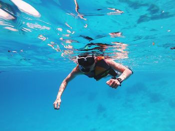 Man swimming in sea