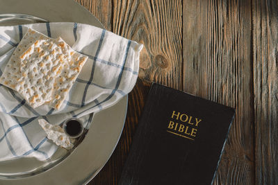 Communion. religious tradition of breaking bread. bread and wine