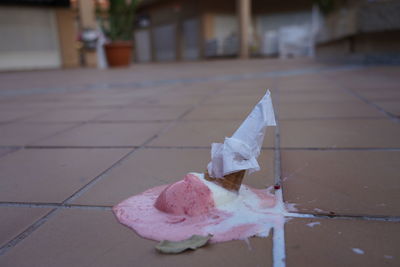 Close-up of ice cream on floor