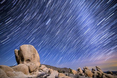 Low angle view of star field against sky at night