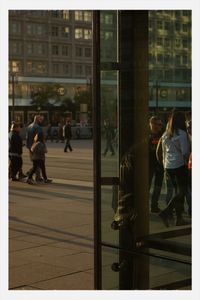 People walking on city street