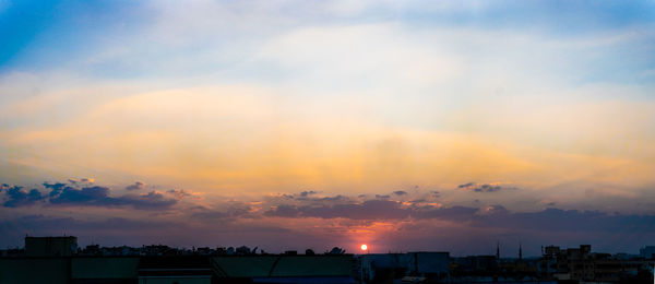 Scenic view of dramatic sky during sunset