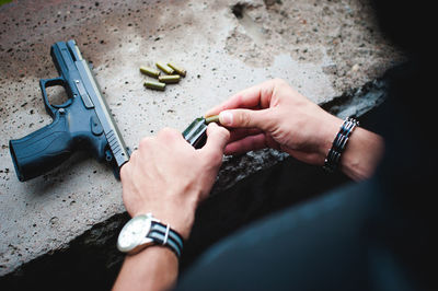 High angle view of hands working