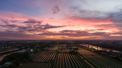 High angle view of cityscape against sky during sunset