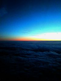 Scenic view of calm sea at sunset