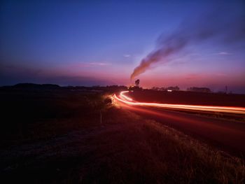 Light trails on road at night