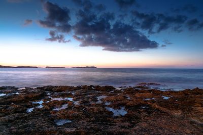Scenic view of sea against sky during sunset