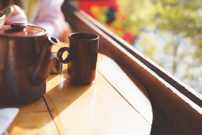 Close-up of coffee cup on table