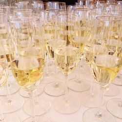 Close-up of wine glasses on table