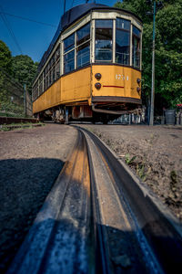 Tram and railroad in milan, italy. covid-19 lockdown. no one in the street. desert city quarantine