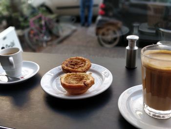 Coffee served on table at cafe