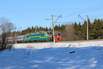 Trains with trees in background