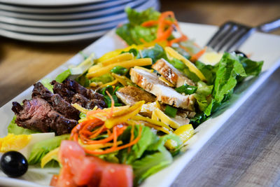 Close-up of food in tray on table