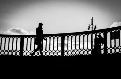Silhouette of woman at sunset