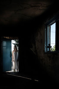 Woman standing in the doorway