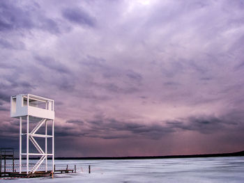 Scenic view of frozen lake against sky