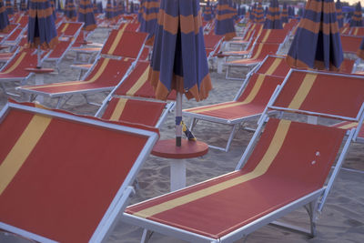 High angle view of people on empty chairs