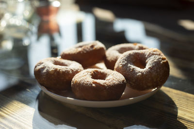 Close-up of donuts on table