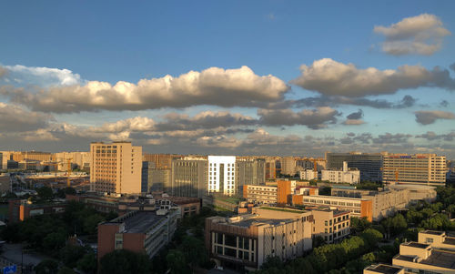 Buildings in city against sky