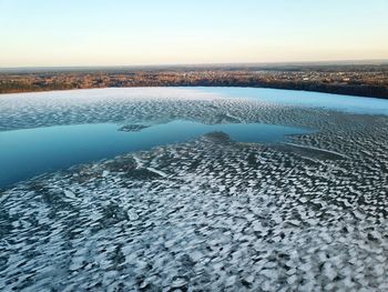 Scenic view of lake against clear sky