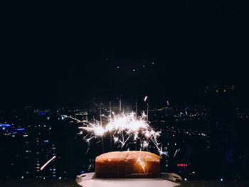 Firework display at night