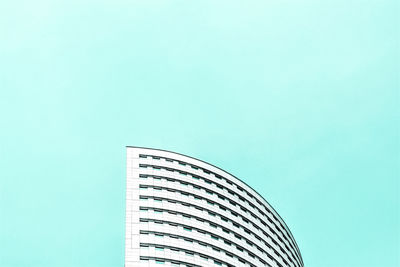 Low angle view of modern building against clear sky