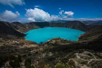 Scenic view of landscape against blue sky