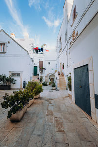 Footpath amidst buildings in town