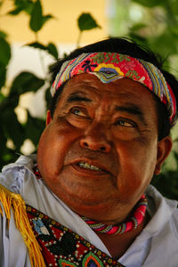 Close-up portrait of mid adult man