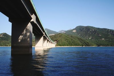 Bridge over river against sky