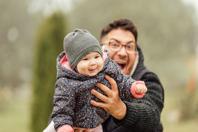 Portrait of mother with baby girl