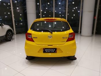 Yellow toy car on floor