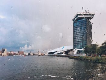 Buildings in city against sky