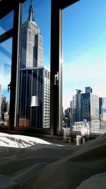 Modern buildings against sky in city