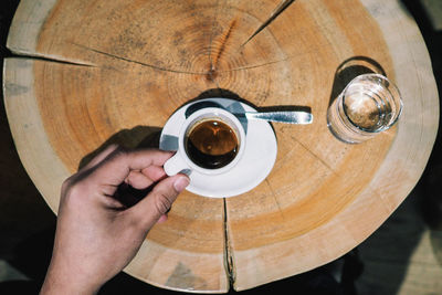 High angle view of coffee cup on table