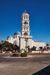 Low angle view of church against clear blue sky